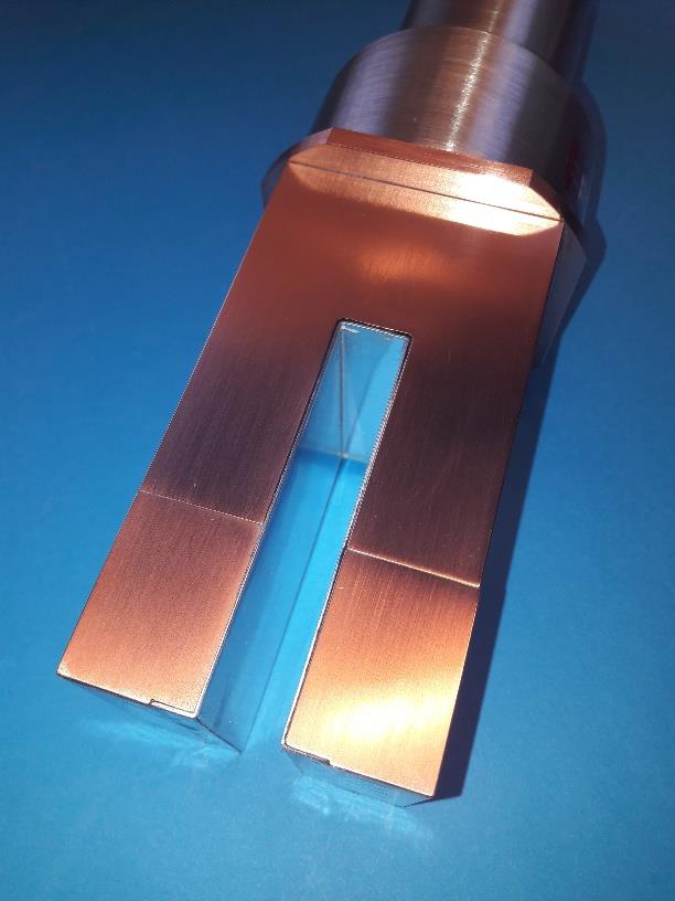 A crystal in a machined copper housing for low-background applications.