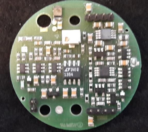 Populated circuit board of a built-in high voltage generator.