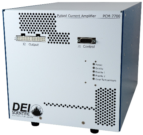 PCM-7700 front three-quarter view showing the J2 output and J1 control connectors