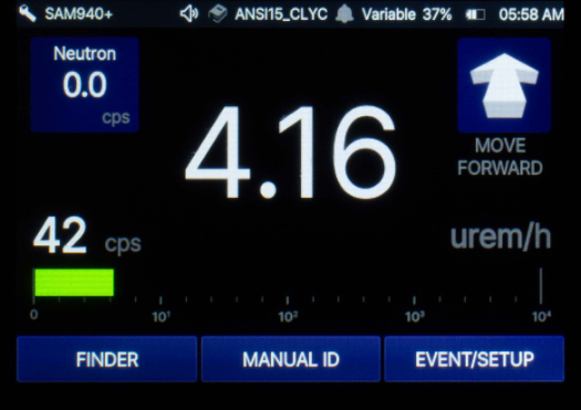 SAM 940+ alarm status screen showing dose rate, neutron count and directional move-forward guidance