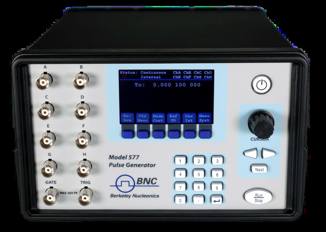 Model 577 front panel: channel output BNC connectors, GATE and TRIG inputs, LCD display, rotary knob and keypad