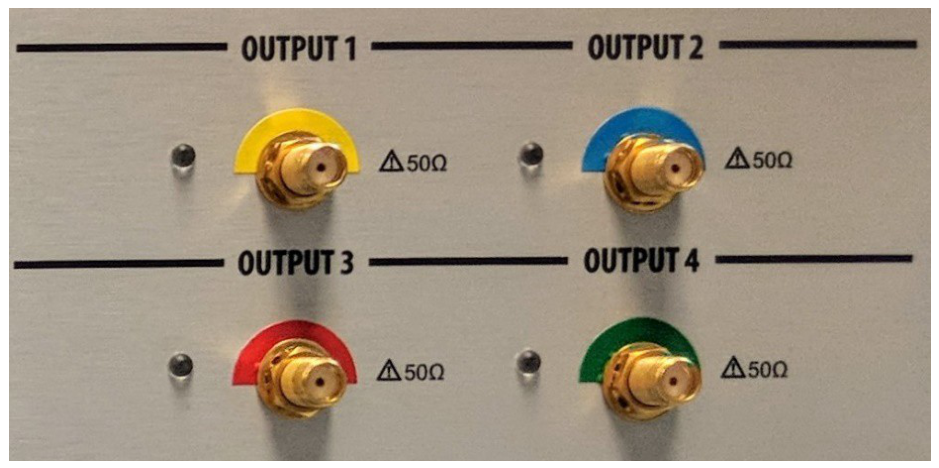 Model 765 front-panel SMA output connectors OUTPUT 1 to OUTPUT 4