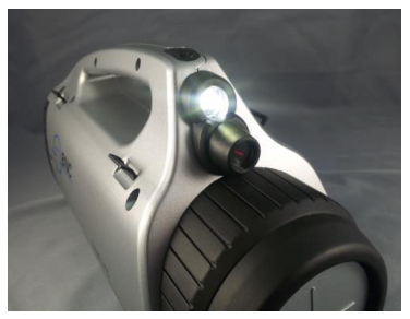 Front of the detector unit showing the flashlight and laser pointer windows
